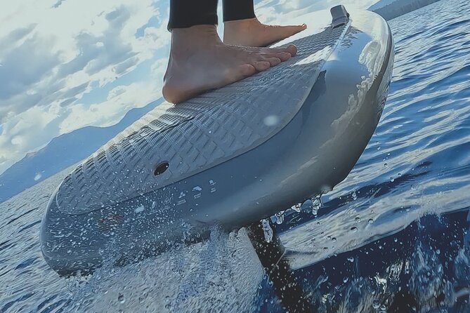 1-Hour Private E Foil Surfing Lessons in Istria - The step-by-step lesson: belly, kneeling, then standing on the Fliteboard