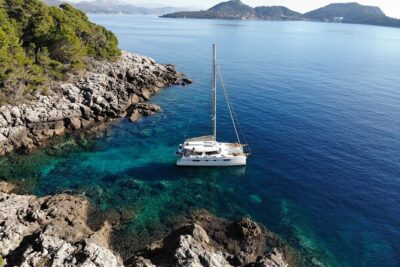Adventure Sailing 4 Night Dubrovnik Cruise on the Huck Finn Cat - Day 2: Elaphiti Islands swim break at Koločep and night by Šipan