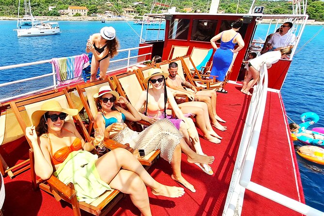 All-Inclusive Blue Lagoon & 3 Island Boat Tour with Food & Drinks - Stop 2: Krknjasi Bay And The Blue Lagoon Swim Window