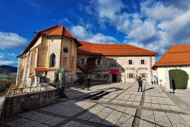 Best of Slovenia: Bled, Postojna, Ljubljana Day Tour from Zagreb - Lake Bled town and why thermal water keeps showing up