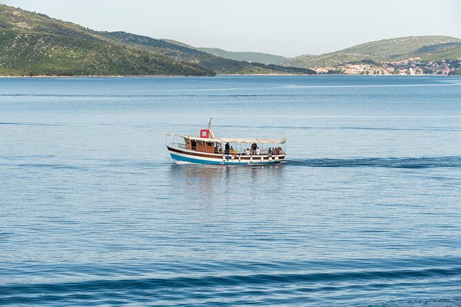 Blue Lagoon 3 Islands Tour with Lunch and Drinks Included - Maslinica on Šolta: Pirate-era backstory and Marchi Castle