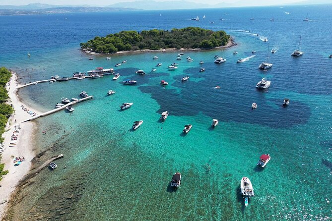 Blue Lagoon Tour from Split with Bottled Water and Wine Included - What’s included for $76.22: wine, water, goggles, speedboat, and fees