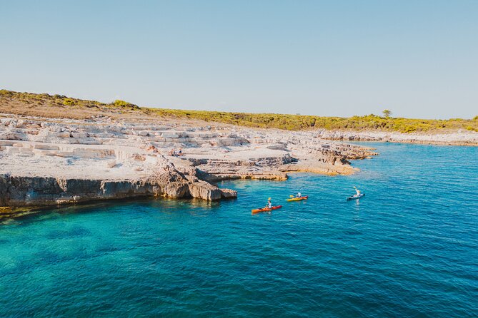 Cave Adventure near Pula by Kayak - Sea tunnel to cave entry: what turquoise light actually means