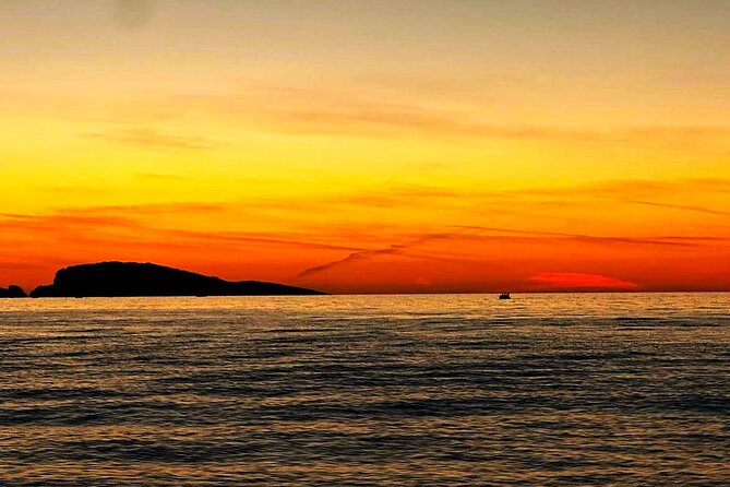 Cavtat Sunset Escape Romantic Cruise and Free Flowing Drinks - Passing Supetar Island: Quiet Water, Rocky Shoreline, Wild Feel