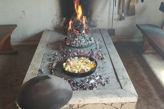 Croatian Traditional Cuisine: Peka Cooking Lesson - While it cooks: bread, cheese, olive oil, wine, and the rest of the Croatian table
