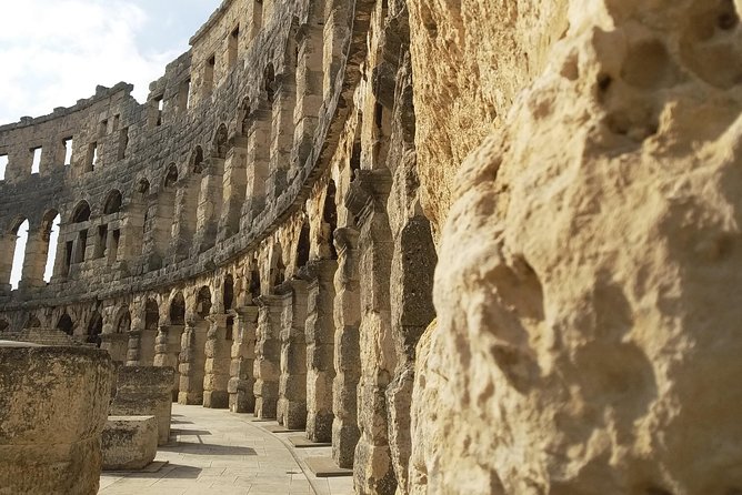 Curiosities and secrets of Pula - A private Pula story walk: arena, tunnels, and market energy