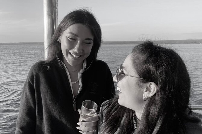 Dolphin Watching & Sunset Boat Tour With Dinner and Drinks - Dinner and Unlimited Drinks: Simple, Included, and Sometimes a Mixed Bag
