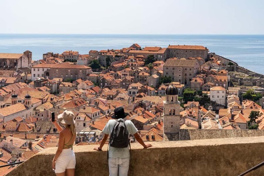 Dubrovnik: City Walls, Stradun & Old Town Story Walking Tour - Orlando’s Column, Sponza Palace, and Rector’s Palace: power in plain sight