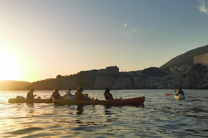 Dubrovnik: Sunset Kayak & Snorkel Tour with Wine & Water - Adriatic Sea paddling: history stops plus a snack break