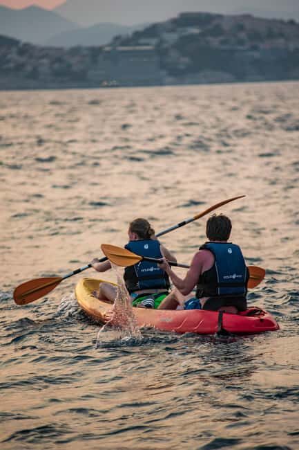 Dubrovnik: Sunset Kayaking and Snorkeling Tour - Wine onshore: the perfect end to tired arms