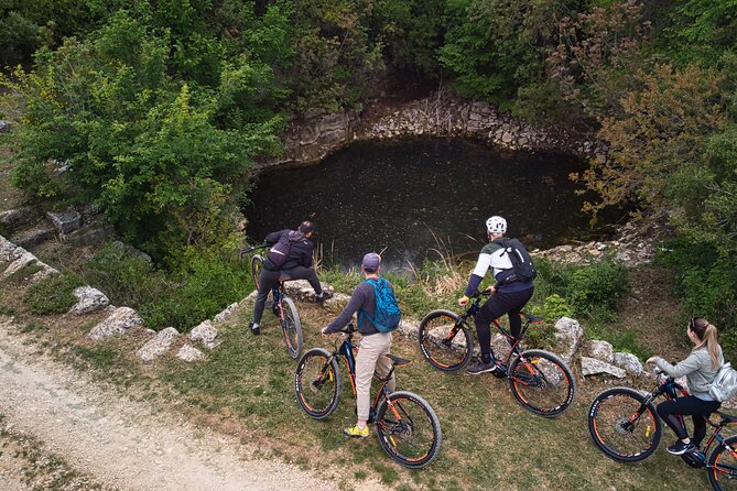 E Bike Tour with wine and olive oil tasting in Vodnjan - Barbariga’s swim break: turning gears into swim time