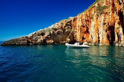 Exclusive Private Tour: Red Rocks & Pakleni Islands - Stop 1: Red Rocks on Hvar for cliffside snorkeling and cave-style exploring