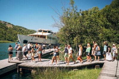 From Split: Krka Waterfalls, Food & Wine Tasting Tour - Skradin: fortress views, river-to-sea water, and easy lunch options