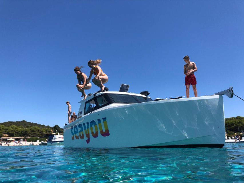 From Split: Luxury Cabin Boat Tour to The Blue Cave and Hvar - Entering the Blue Cave: paddle boat, ticket timing, and the blue light