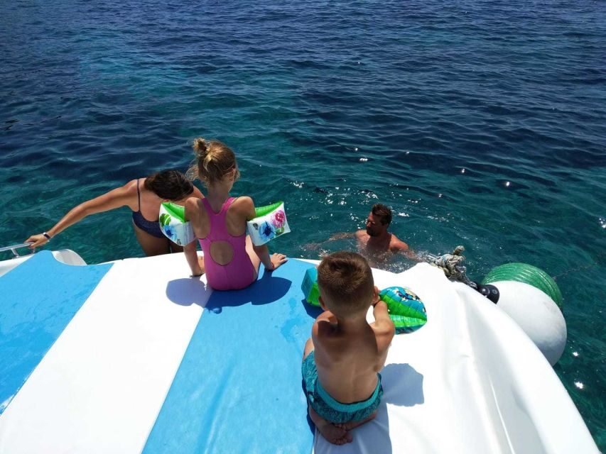 From Split: Luxury Cabin Boat Tour to The Blue Cave and Hvar - Vis and Komiža: coffee by the sea in a small-town setting