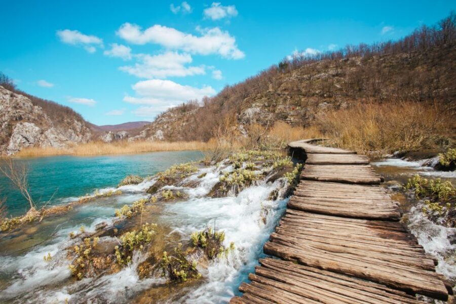 From Split or Trogir: Plitvice Lakes Guided Tour - The electric train ride back via Prošćansko Lake
