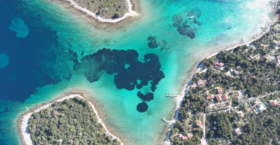 From Split: Trogir & Blue Lagoon Boat Tour with Snorkeling - Krknjaši Blue Lagoon snorkeling: clear water time with real-world conditions