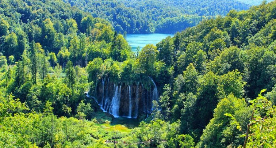 From Zagreb: Plitvice Lakes & Rastoke Private Tour - Inside the park: waterfalls, rain spray, and that rainbow moment