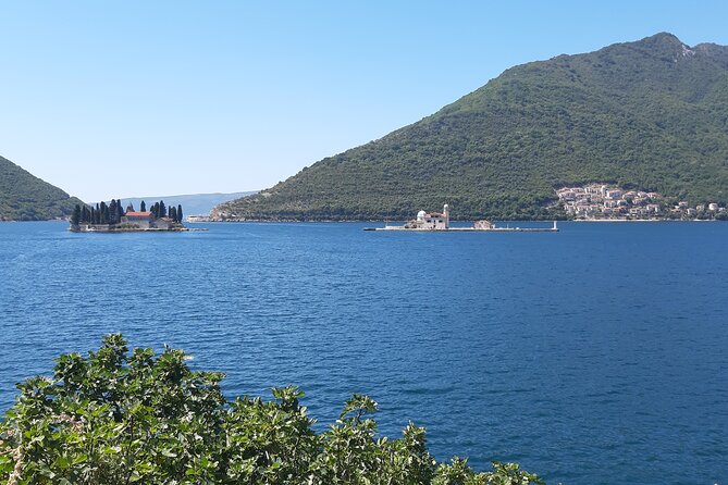 Full-Day Tour Bay of Kotor Perast Kotor and Budva small group from Dubrovnik - Perast and Our Lady of the Rocks: time it right, pay if you want the boat