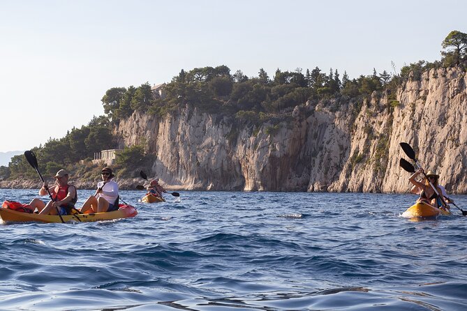 Half-Day Small-Group Kayaking Tour in Makarska - Old town Makarska from the water: churches, harbor curves, and mountains
