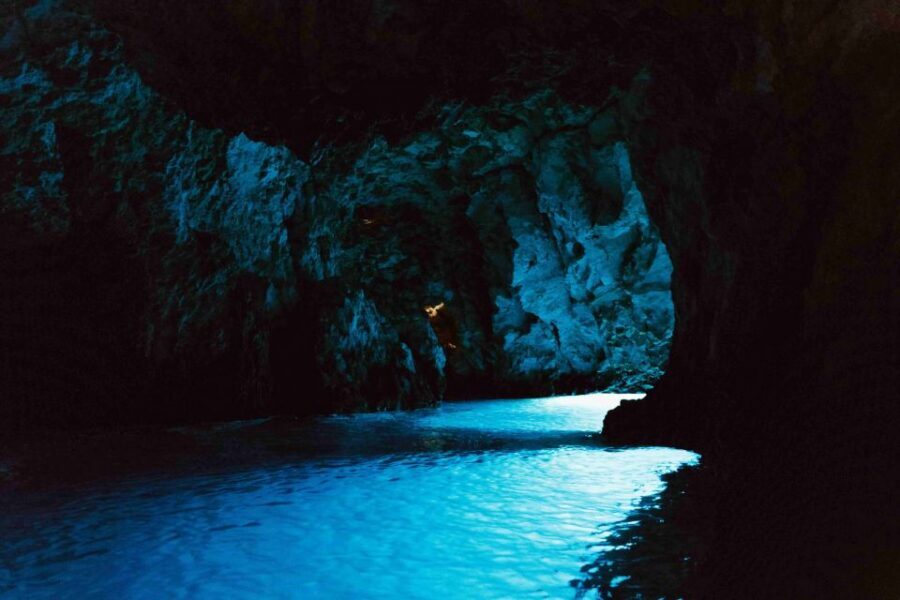 Hvar: Blue and Green Caves Boat Tour with Stiniva Beach - Green Cave: light filters in and the vibe shifts