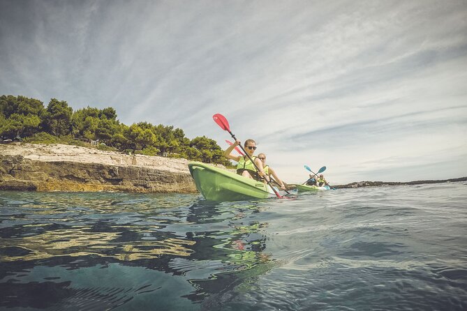 Kayak tour in Pula to Valley of Tears/free drinks+photos included - Snorkeling, cliff jumping, and the cave you should not count on