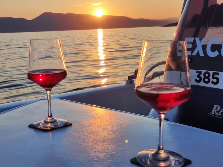 Krk: Sunset Boat Tour with wine, high chance of dolphins - Entering the bay of St. Fuska: the calm before the sunset