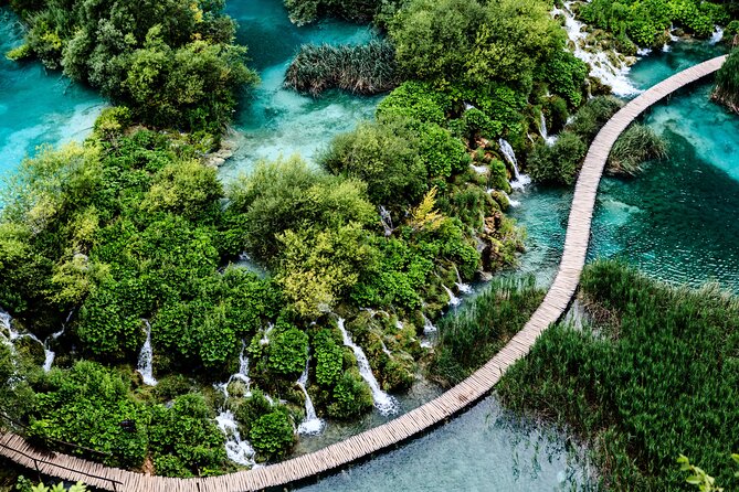 Krka Waterfalls Tour - Trip from Split with Boat & Swimming - Skradin: free time for swimming, café stops, and fortress views