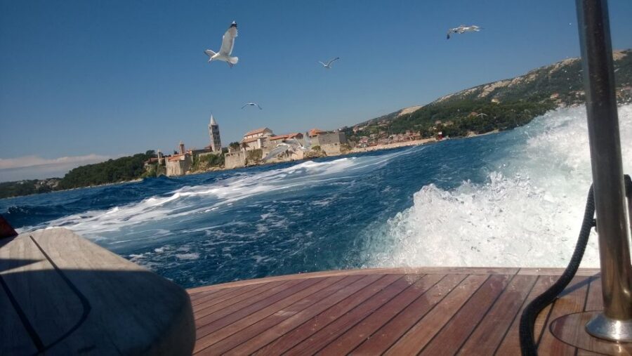 Krk:Rab & Pag Boat Trip with Swimming & City Tour with lunch - Lunch on the Open Deck: Fish or Meat, Sea Air, and Seagulls Doing Their Job