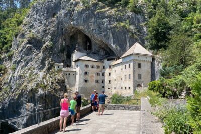 Ljubljana, Postojna Cave&Predjama Castle with Tickets from Zagreb - Predjama Castle inside the cave mouth: audio tour time