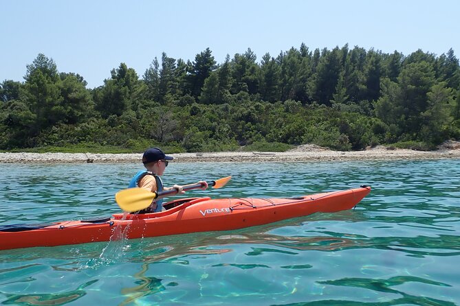 Lumbarda-Sunset Kayaking Experience with picnic: Wine and Sweets - The sunset paddle: where the red sun drops and why timing matters