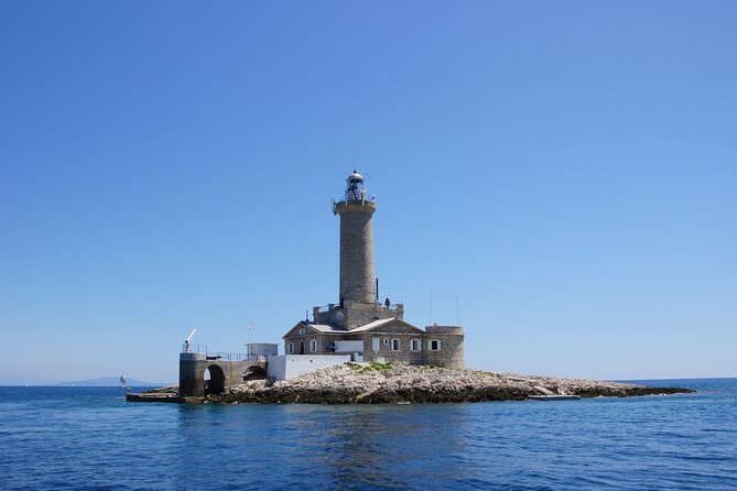 Medulin -Kamenjak 5h boat trip with lunch & drinks on Sandra Boat - Porer lighthouse cruise-by: quick context, memorable detail
