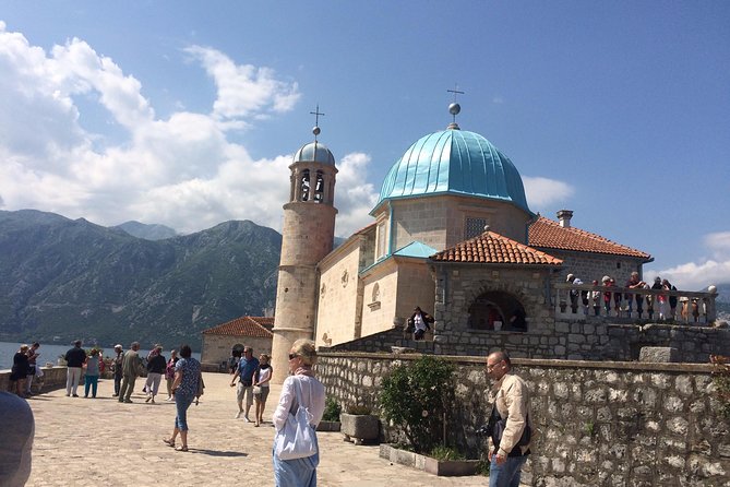 Montenegro private daytrip from Dubrovnik, Perast, Bay of Kotor - Clock Tower, St. Luke Church, and the Anchor Outside Maritime Museum