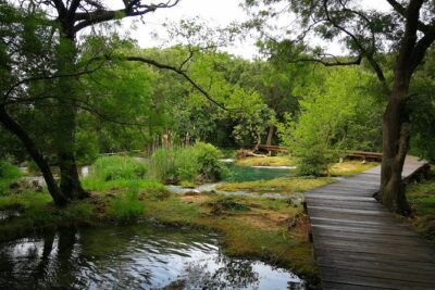 NP Krka waterfalls & Wine tasting - Private day tour from Split - Stop 1 in Krka: Mills, Ethnographic Museums, and Wooden River Walkways