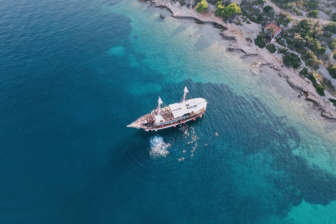 Out to Sea Split Boat Party w/ Blue Lagoon Swim, Dj & Afterparty - Photographer on Board: Proof You Enjoyed the Chaos