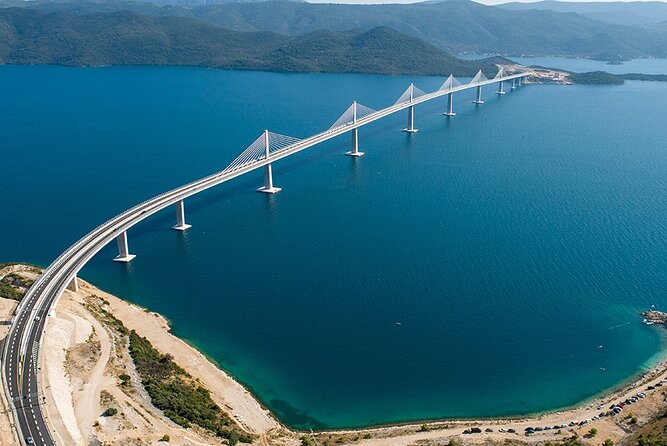 Oysters & Wine & AUTHENTIC boat tour with GOURMET LUNCH in price - Pelješac Peninsula: wine choice, Travarica aperitif, and gourmet lunch