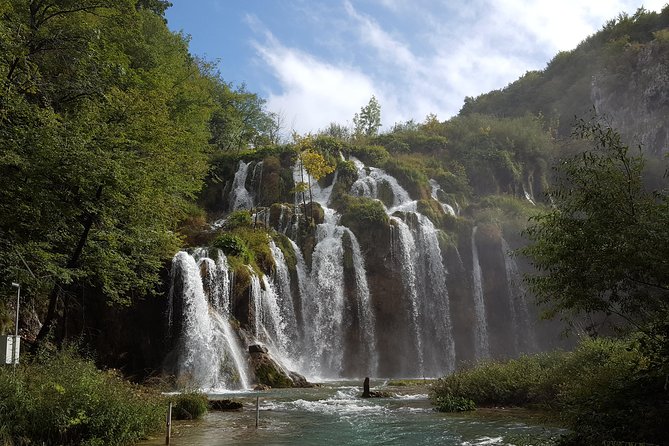 Plitvice Lakes Day Tour – Group Tour - Inside Plitvice Lakes National Park: boat, panorama train, and the views in context