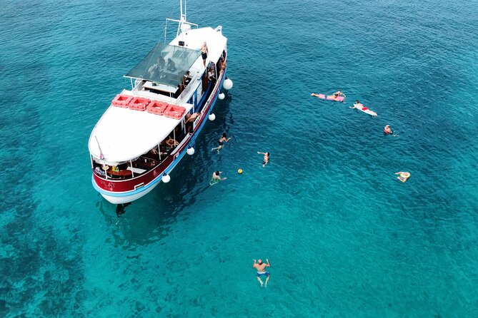 Podstrana and Jesenice, Boat trip to Brač and Šolta with lunch - Anchored swim stops: ladders, floaties, and easy snorkel gear