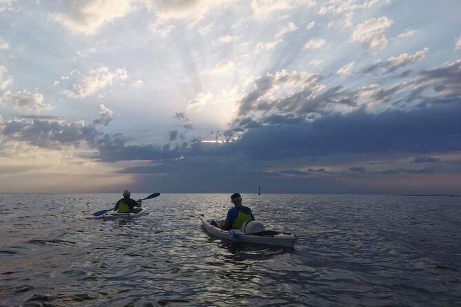 Poreč sunset sea kayaking tour - Snacks, photos, and the calm rhythm of a harbor paddle