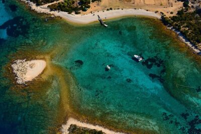 Private Blue and Green Cave Tour from Hvar Town - Stop 1: Green Cave on Ravnik Islet (Emerald Light + Swim Time)