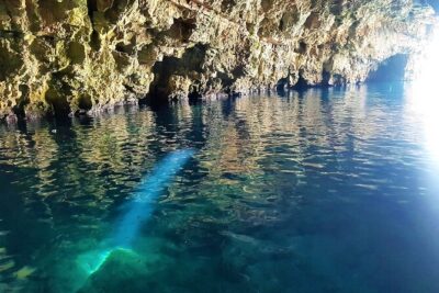 Private Boat Tour from Hvar - Blue and Green cave, Vis, and the Pakleni islands - Stop 1: Stiniva Cove on Vis—Cliffs, Lost Cave Space, and a Beach Like a Film Set