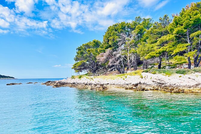Private Half-Day Boat Tour from Split: Blue Lagoon & 2 Islands - Stop 1: Blue Lagoon / Krknjasi Bay for snorkeling and the first big swim