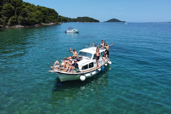 Private Half-Day Boat Tour to nearby Islands in Zadar with Drinks - A private wooden boat is the real upgrade from Zadar sightseeing