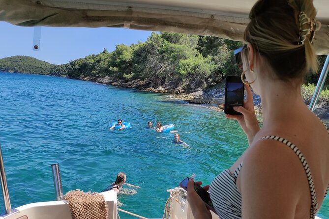 Private Half-Day Boat Tour to nearby Islands in Zadar with Drinks - Ugljan Island: swim and snorkel time where the water does the talking