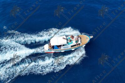 Private Half-Day Boat Tour with Snorkeling and Drinks - The private wooden boat: small-group comfort (up to 7)