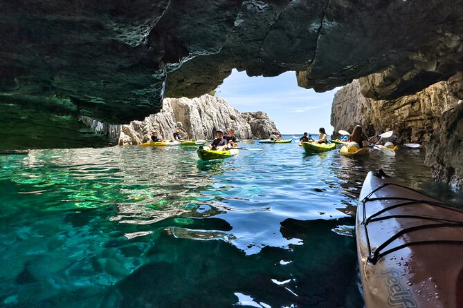 Private kayak tour: Explore the caves and turquoise bays in Pula - How your guide changes the whole day (Alex, Milan, and the local angle)