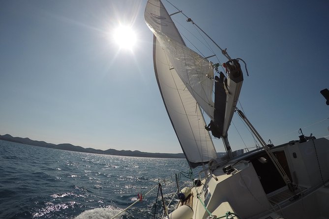 Private Sunset Sailing Tour - Ostri rat and Puntamika Lighthouse at Sunset Time