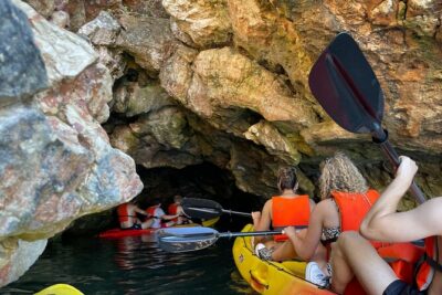 Pula: Cave Kayak Tour and Snorkeling - Kayaking toward Canyon Verudela’s 18-meter cliffs