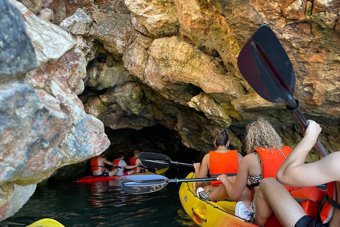 Pula: Cave Kayak Tour and Snorkeling - Kayaking toward Canyon Verudela’s 18-meter cliffs