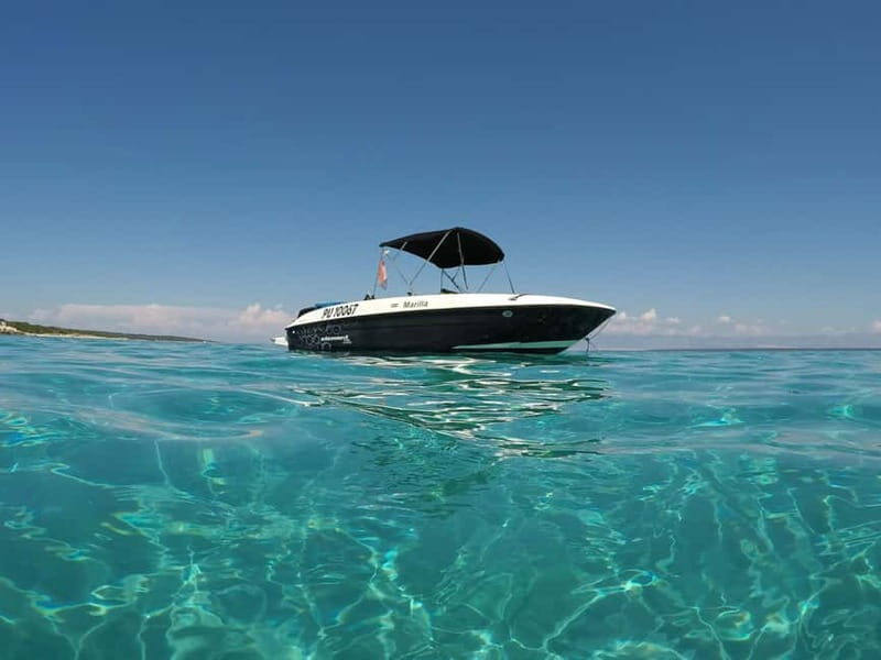 Pula: Cave Private Boat and Snorkeling Tour - Entering Sea Cave Kolumbarica: Light, Swim Time, and Instant Wow